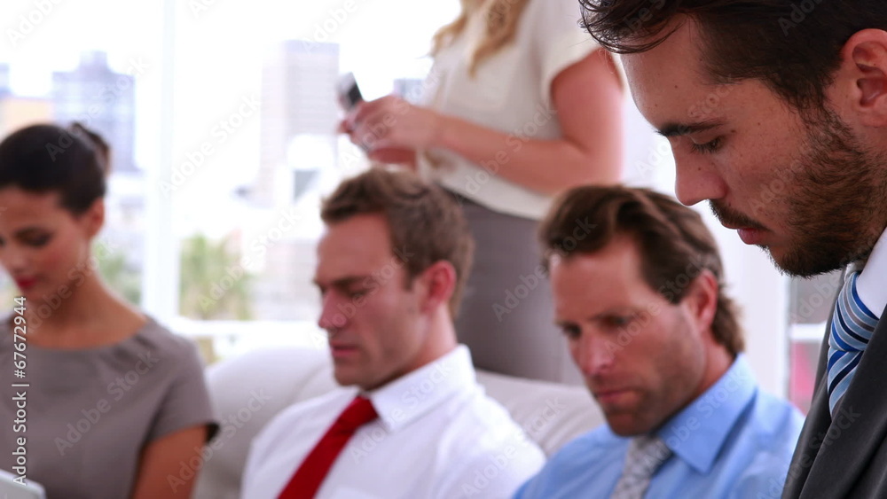 Business team sitting in staff room Business team sitting in staff room