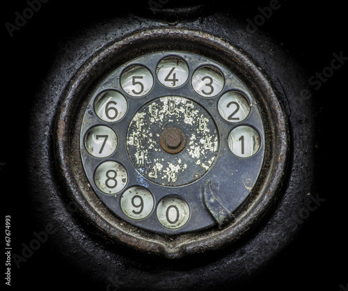 Canvas Print Old black telephone. Close-up of a rotary dial