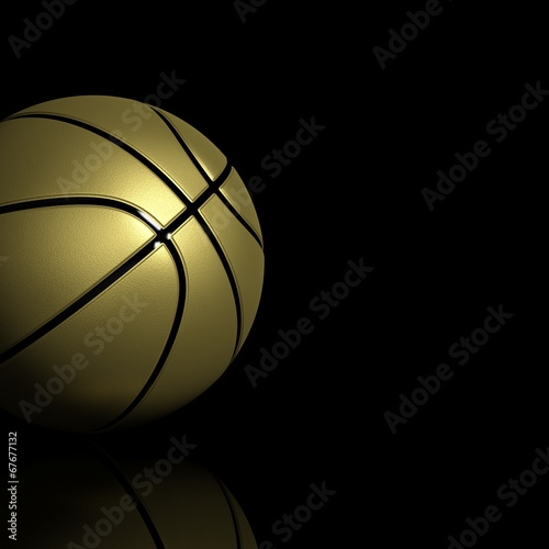 Golden basketball isolated on black with copy-space © viperagp
