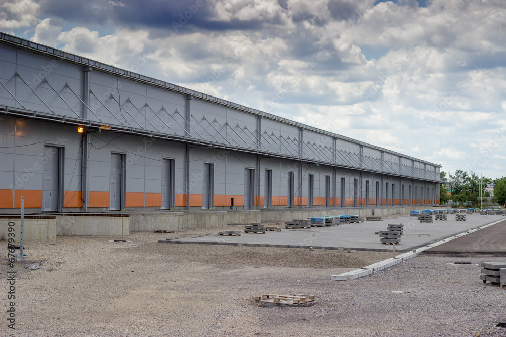 New modern and large warehouse building with warehouse gates