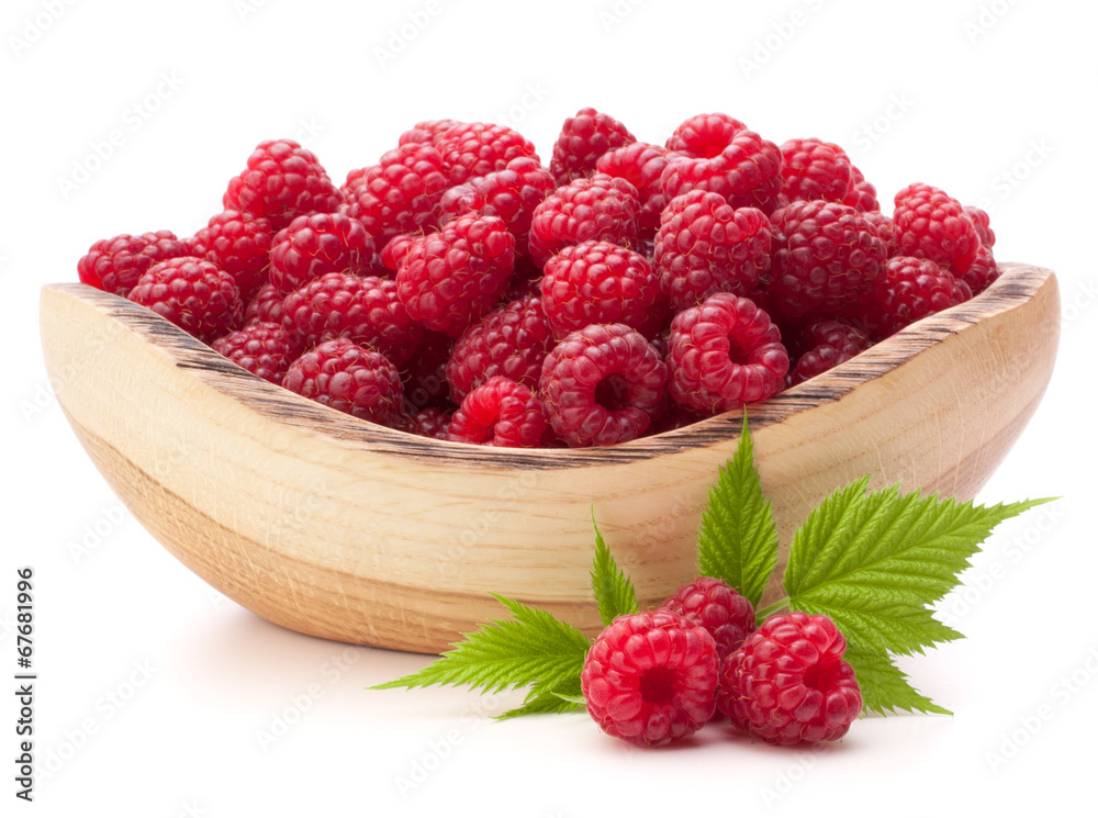 raspberries in wooden bowl raspberries in wooden bowl