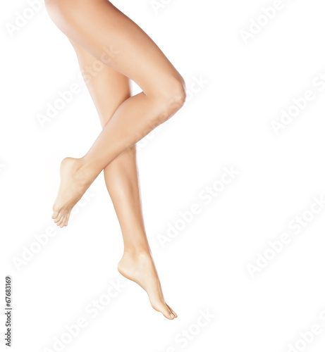 pretty female legs on white background