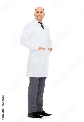 smiling male doctor in white coat