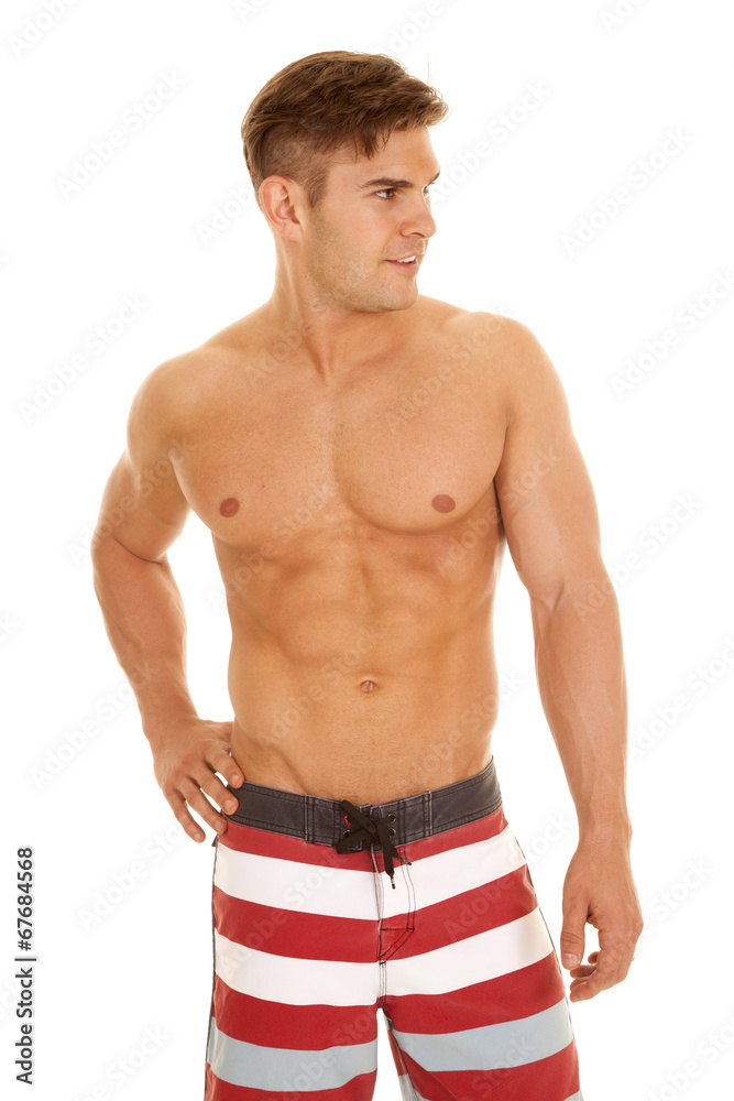 Fototapeta premium man red white stripe shorts look to side