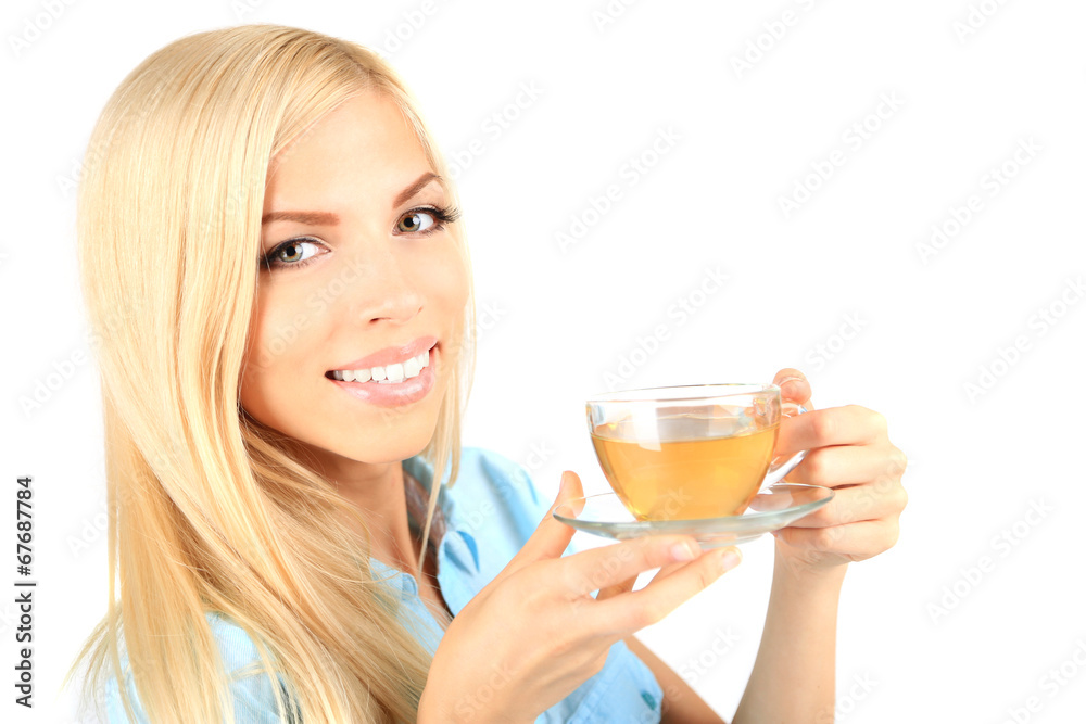 Young beautiful woman with cup of tea isolated on white Young beautiful woman with cup of tea isolated on white