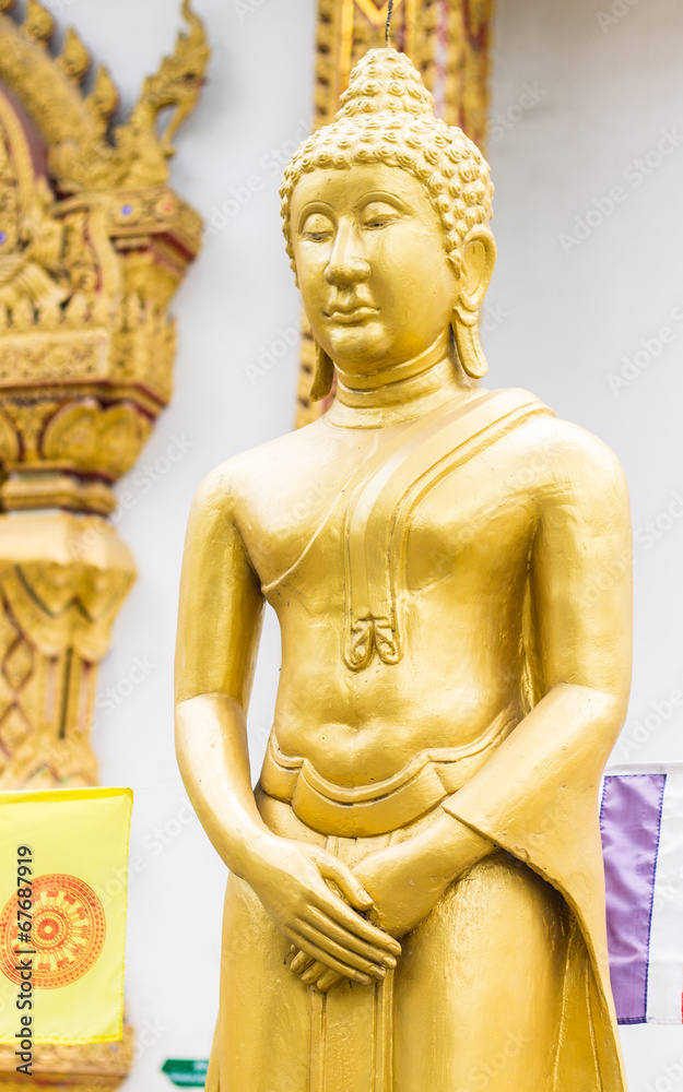 Standing Thai Golden Buddha statue