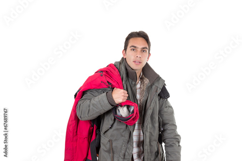 young latin guy carrying backpack
