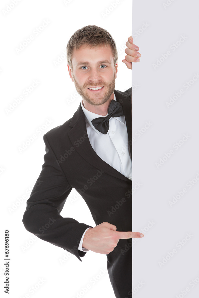 Butler Looking At Blank Billboard Butler Looking At Blank Billboard