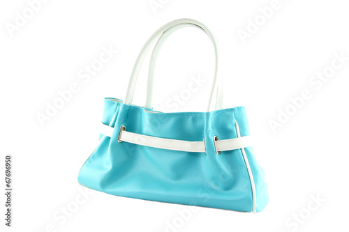 Pale blue handbag of texture leather isolated on white.