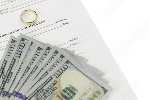 Divorce Form With Hundred Dollars Bills Spread Out On Top