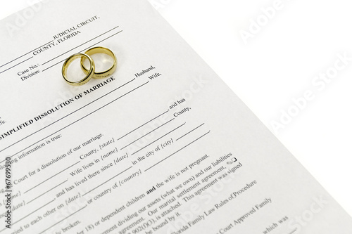 Divorce Form With Pair Of Wedding Rings