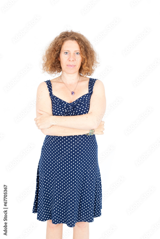 Beautiful woman doing different expressions in different sets of clothes: arms crossed Beautiful woman doing different expressions in different sets of clothes: arms crossed