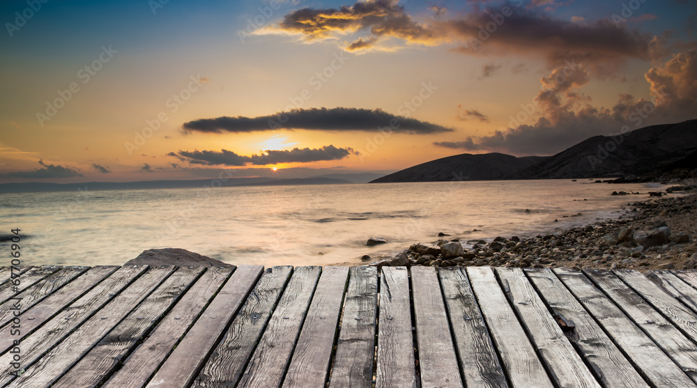 Wooden pier with sea.