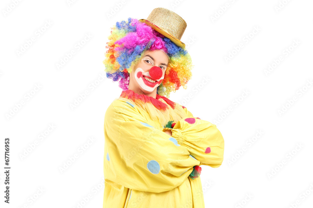 Funny male clown in a yellow costume