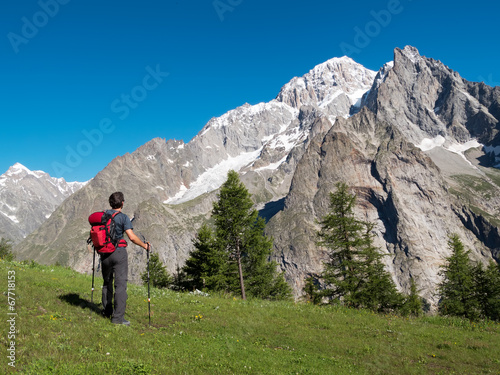 Hiker admiring mountain landscape around Mont Blanc  Courmayer