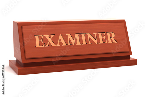 Examiner job title on nameplate photo