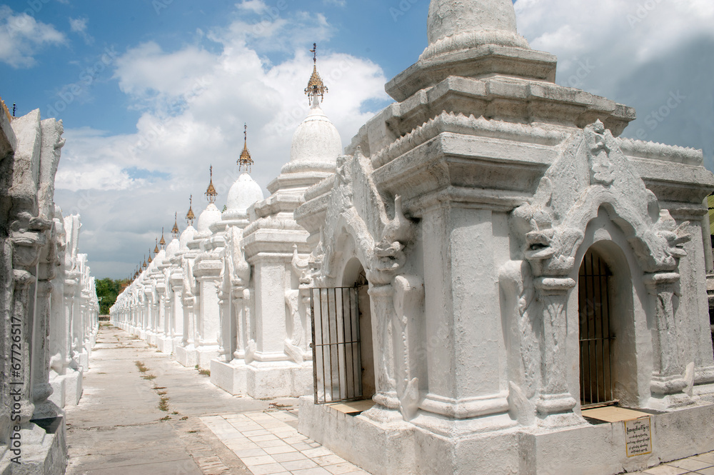 Row of white pagodas in Kuthodaw temple, Myanmar.