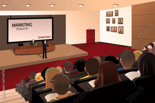 College students listening to the professor in the auditorium