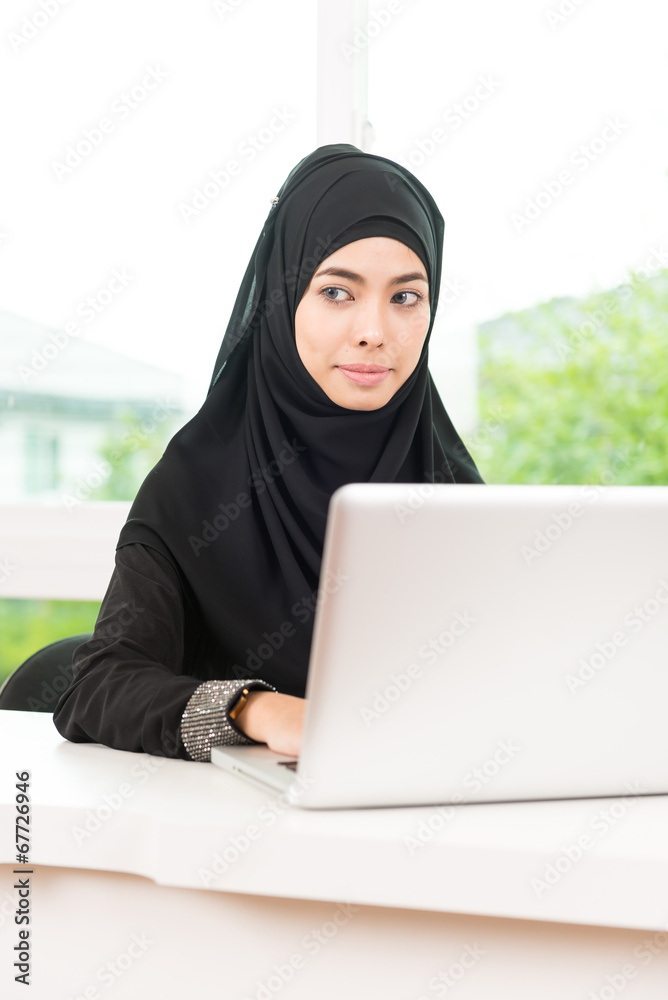 Arab business woman working Arab business woman working