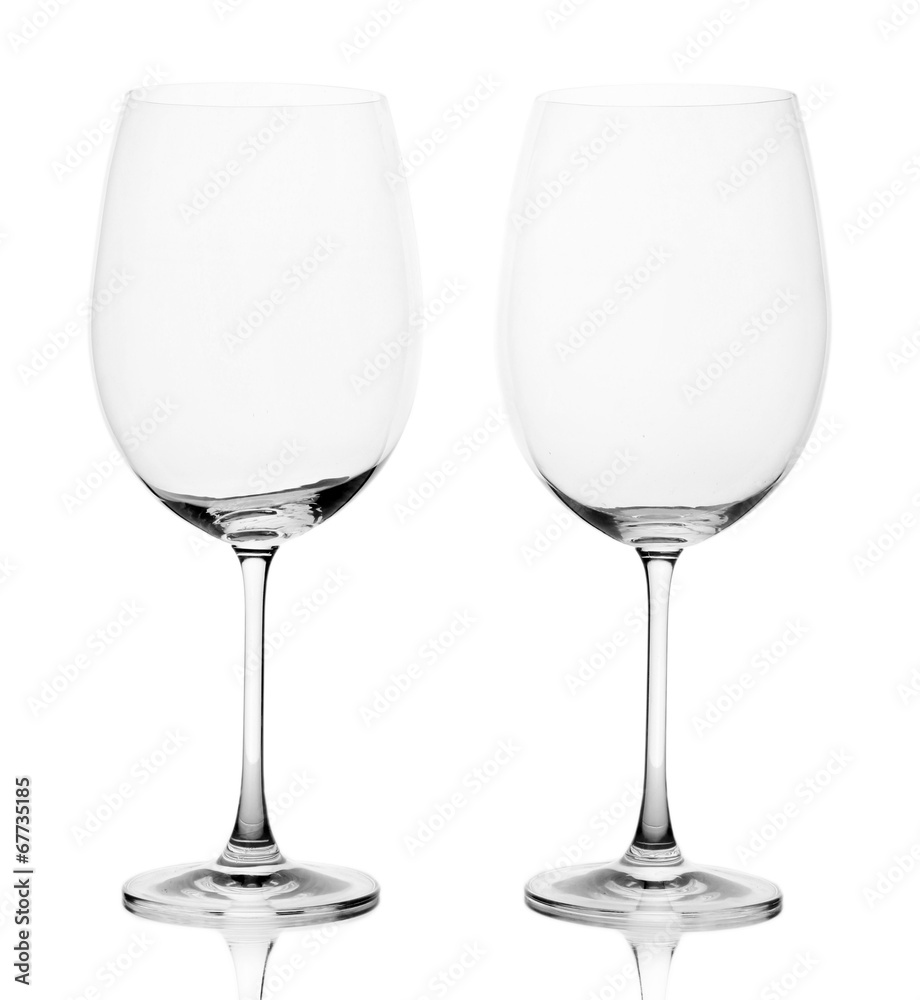 Empty wine glasses arranged and isolated on white Empty wine glasses arranged and isolated on white