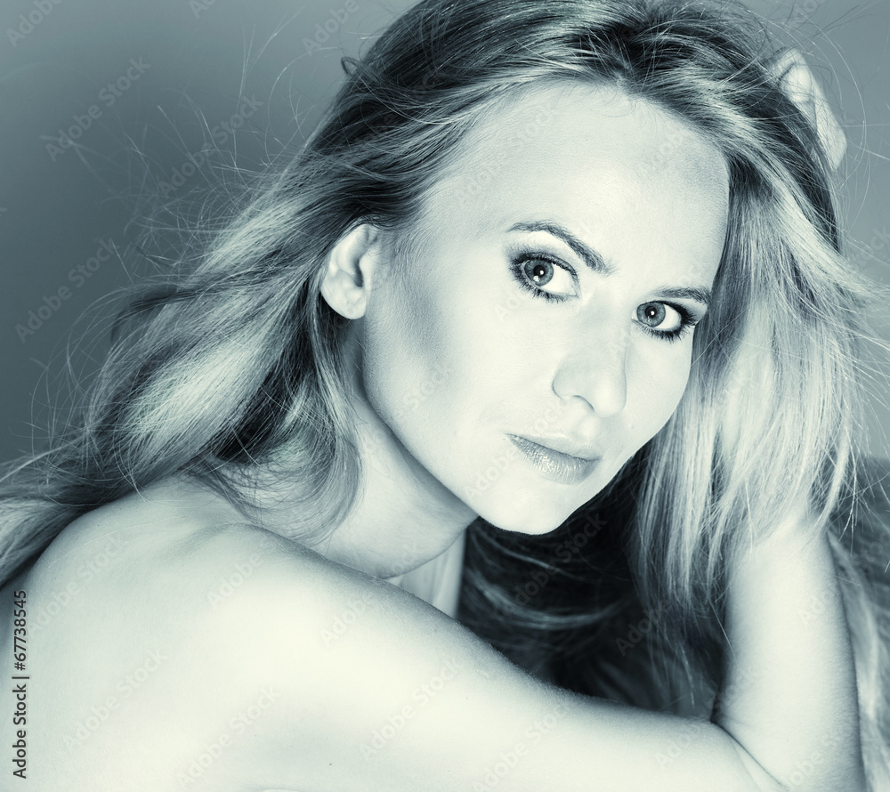 Fototapeta premium Beautiful woman with long flowing hair