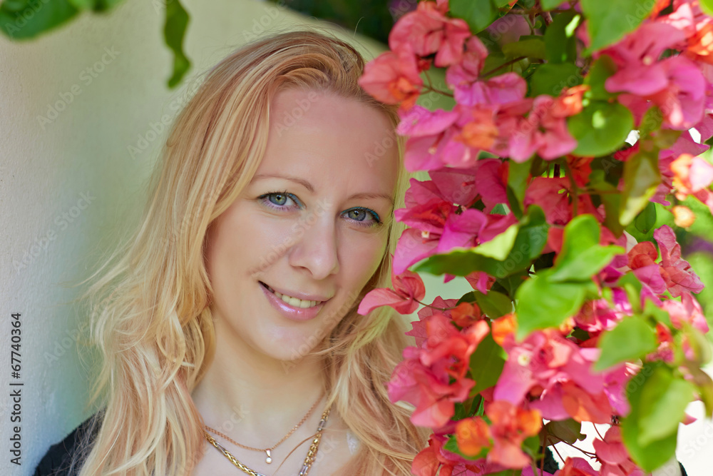Fototapeta premium Close-up of a young woman smiling