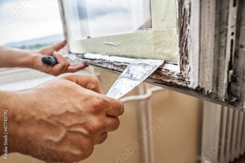 Repairing a window frame photo