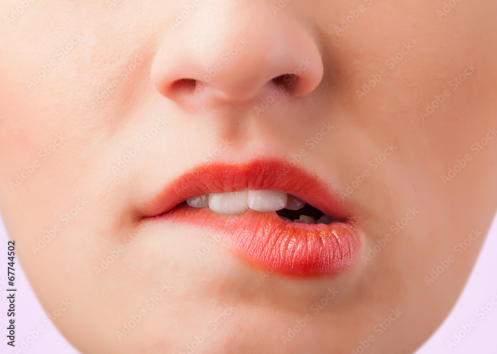 Fototapeta premium Beautiful woman red lips close up