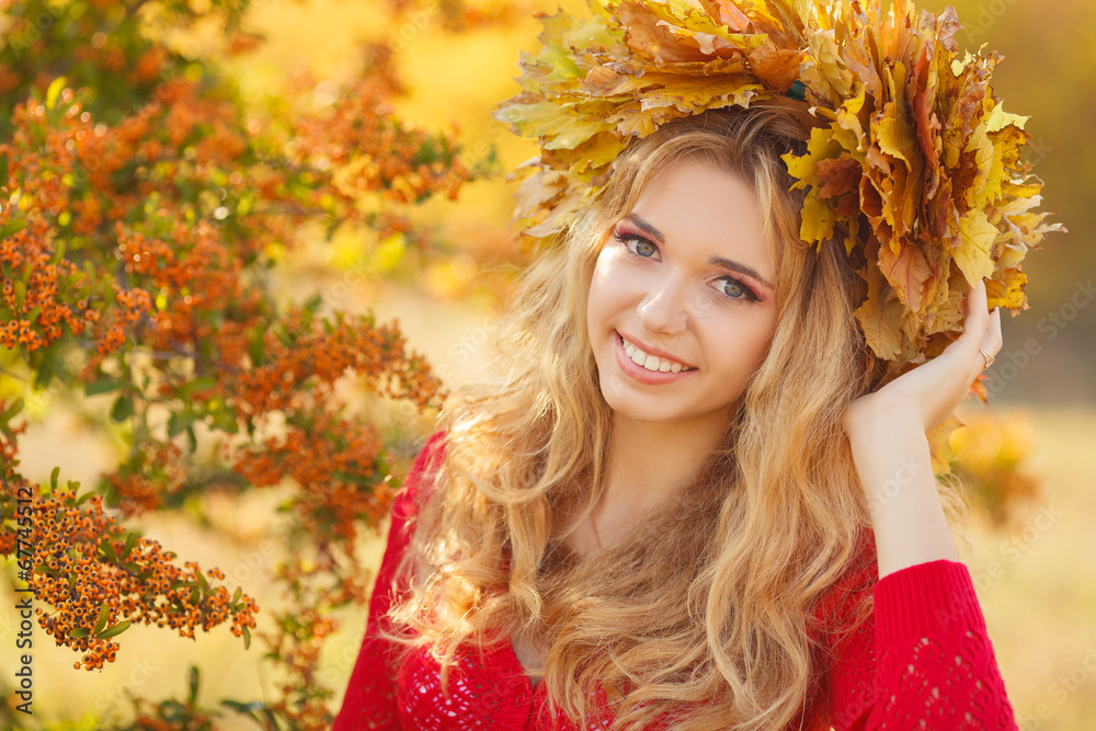 Portrait of beautiful young woman in autumn park. Portrait of beautiful young woman in autumn park.
