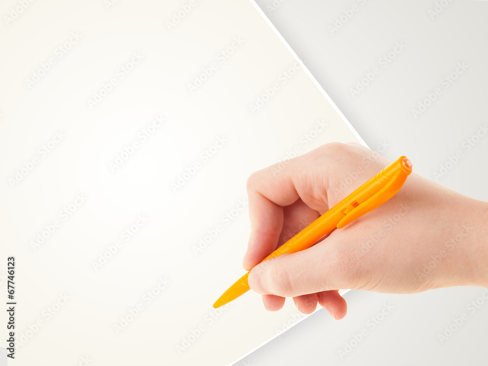 Hand writing on plain empty white paper copy space Hand writing on plain empty white paper copy space