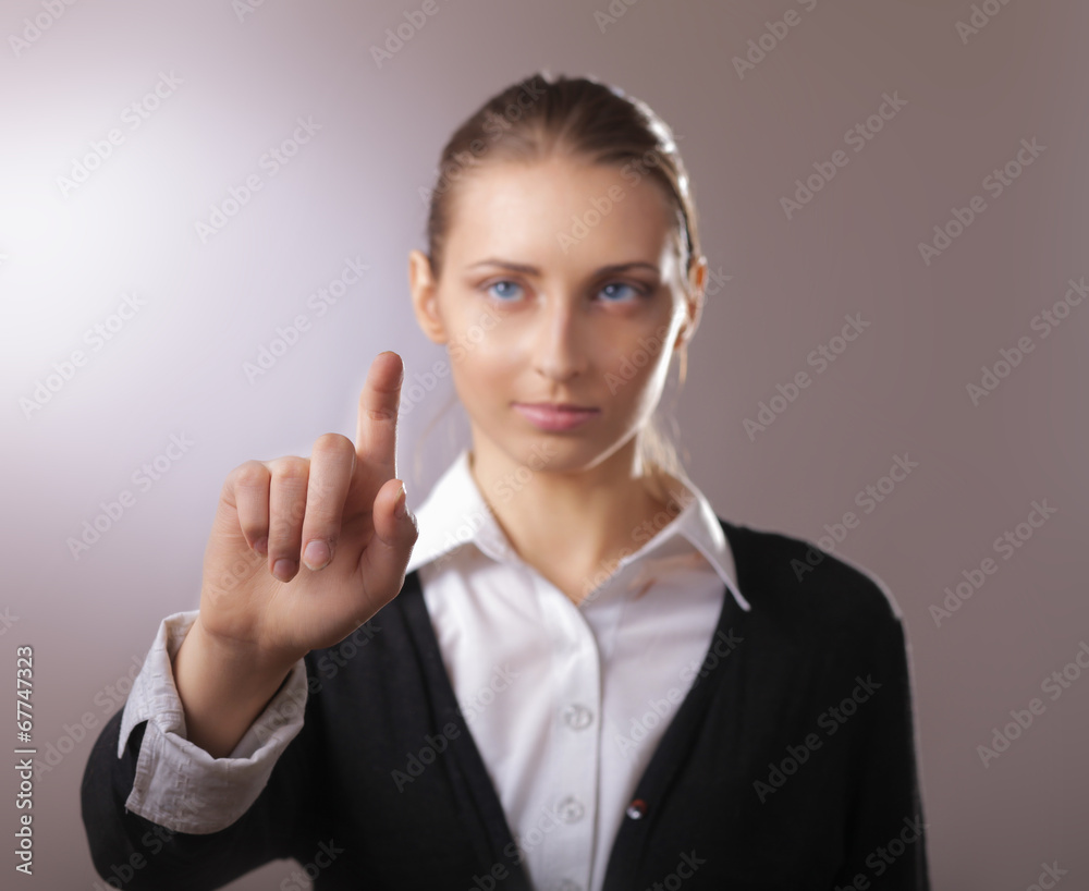 Portrait of a young woman showing something Portrait of a young woman showing something