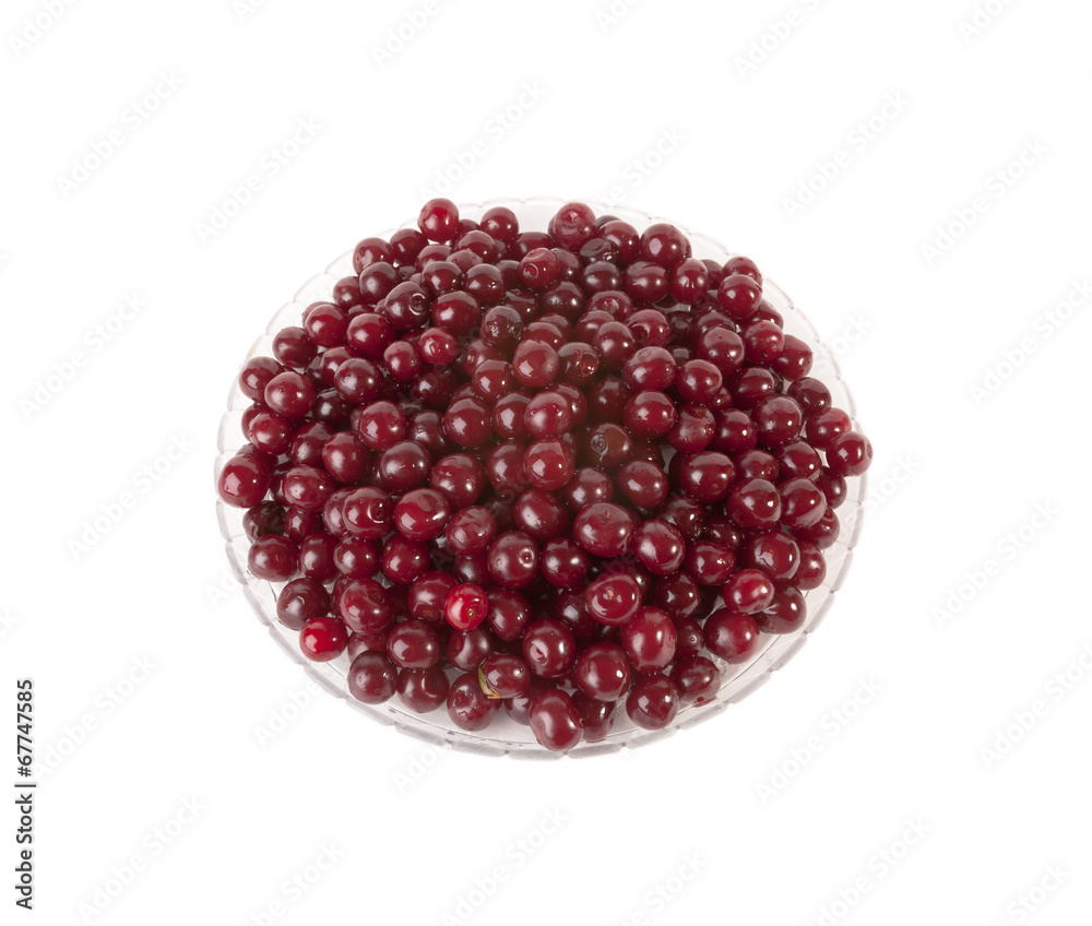 Fresh red Cherries in glass plate on white Fresh red Cherries in glass plate on white