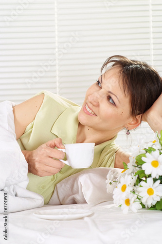 Beautiful female with cup