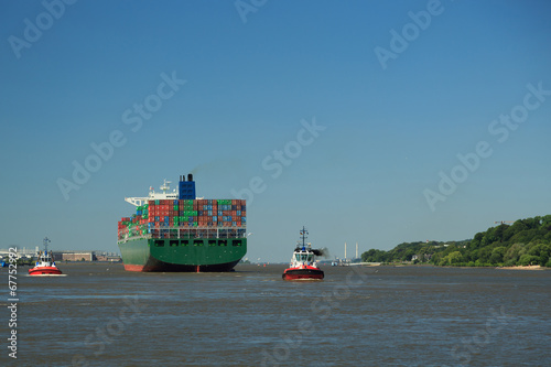 Anonymous containter ship in Hamburg harbor photo