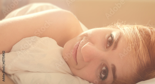 beautiful romantic woman in morning bed