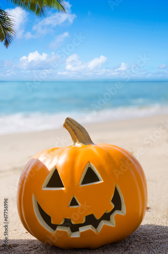 Halloween pumpkin on the beach © ellensmile