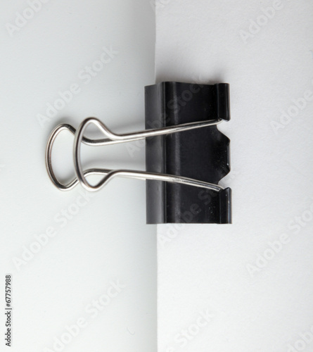 Blank paper with clip isolated in white background