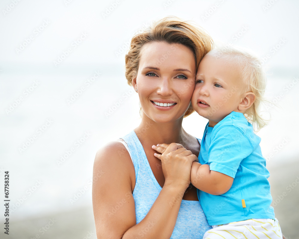 Happy young mother with little son. Happy young mother with little son.