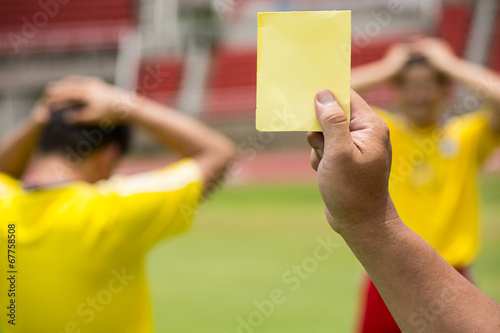 Football Referee warning and recorded photo