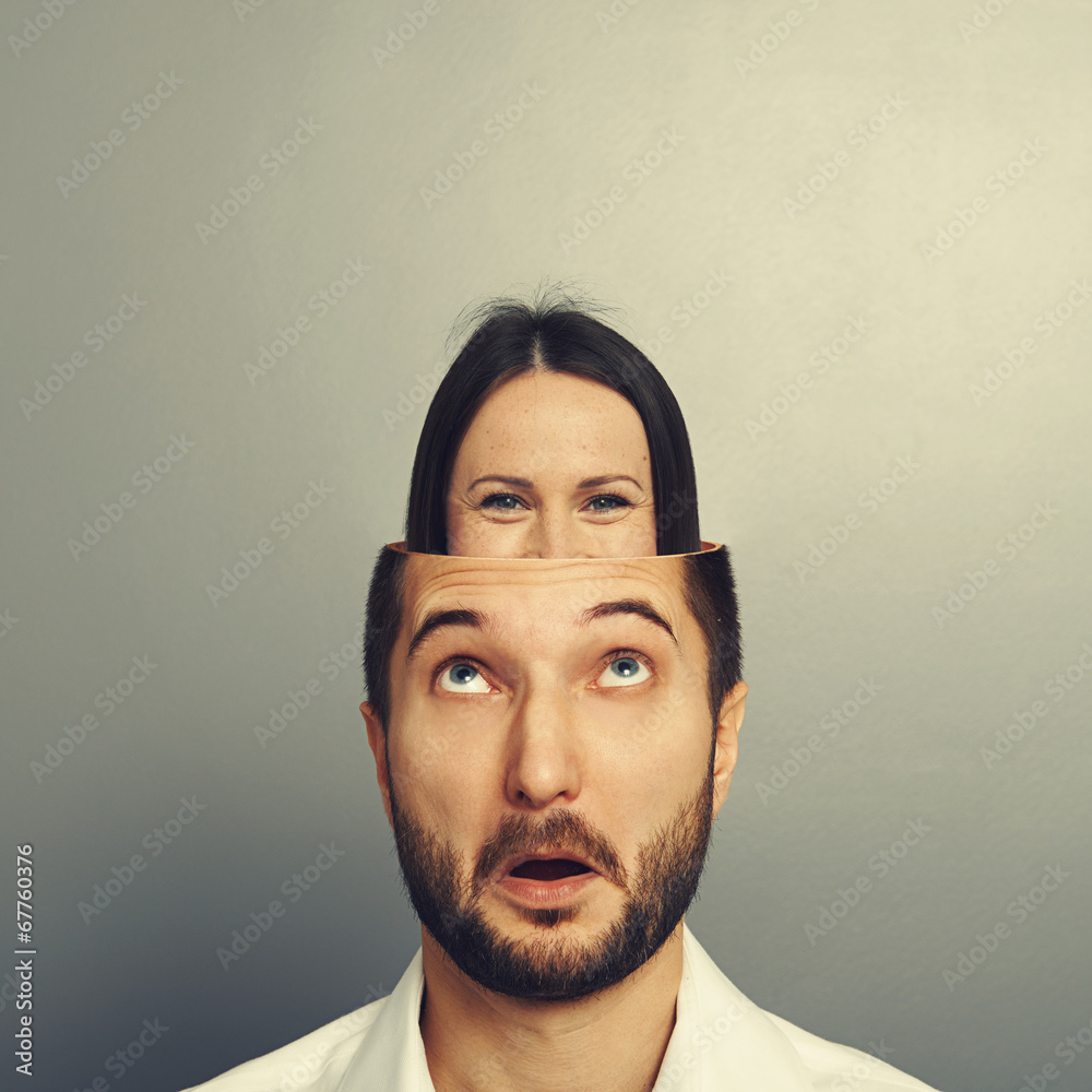 amazed man looking up at woman in his head amazed man looking up at woman in his head