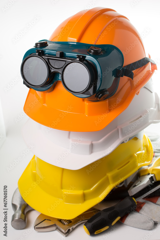 Safety hat and goggles glasses isolated Safety hat and goggles glasses isolated