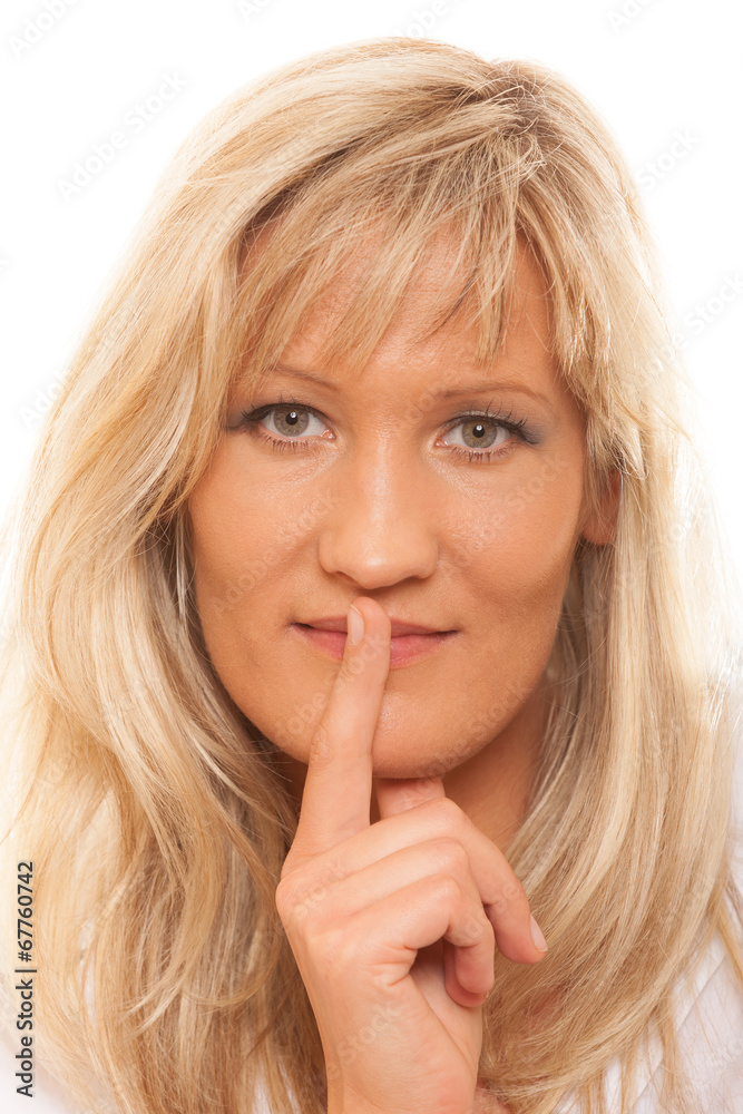 Woman asking for silence finger on lips hush gesture. Woman asking for silence finger on lips hush gesture.