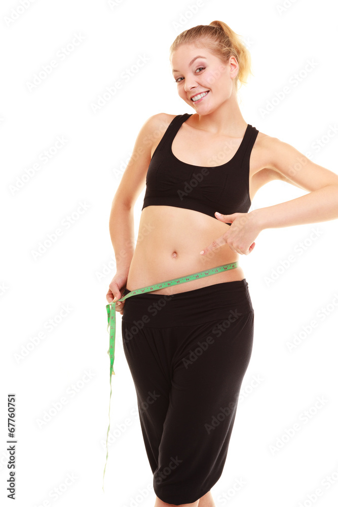 diet. slim blonde girl with measure tape measuring waist