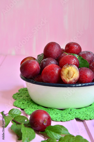 Plum in a white bowl.