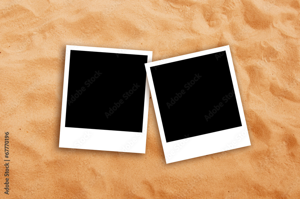 Two Blank photo frames on beach sand Two Blank photo frames on beach sand
