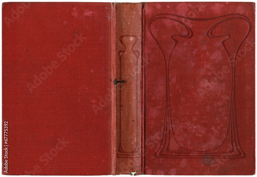 Old open book cover, worn red canvas - circa 1909 - with ornaments in art nouveau style photo