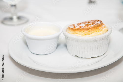 Hot Baked Souffle with Vanilla Sauce on Plate