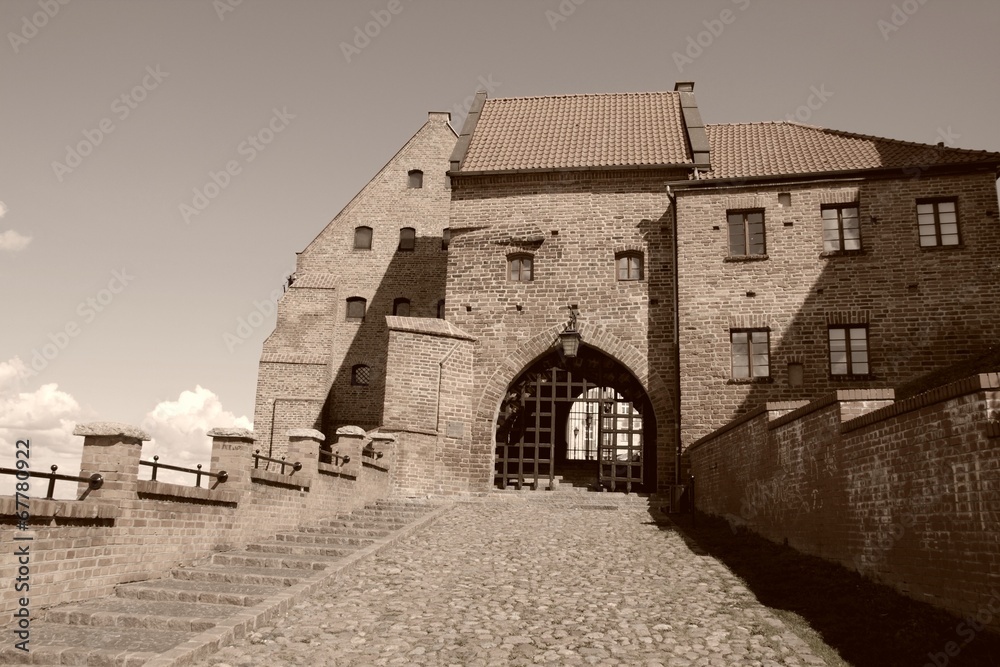 Grudziadz, Poland - old medieval city gate. Sepia toned image. Grudziadz, Poland - old medieval city gate. Sepia toned image.