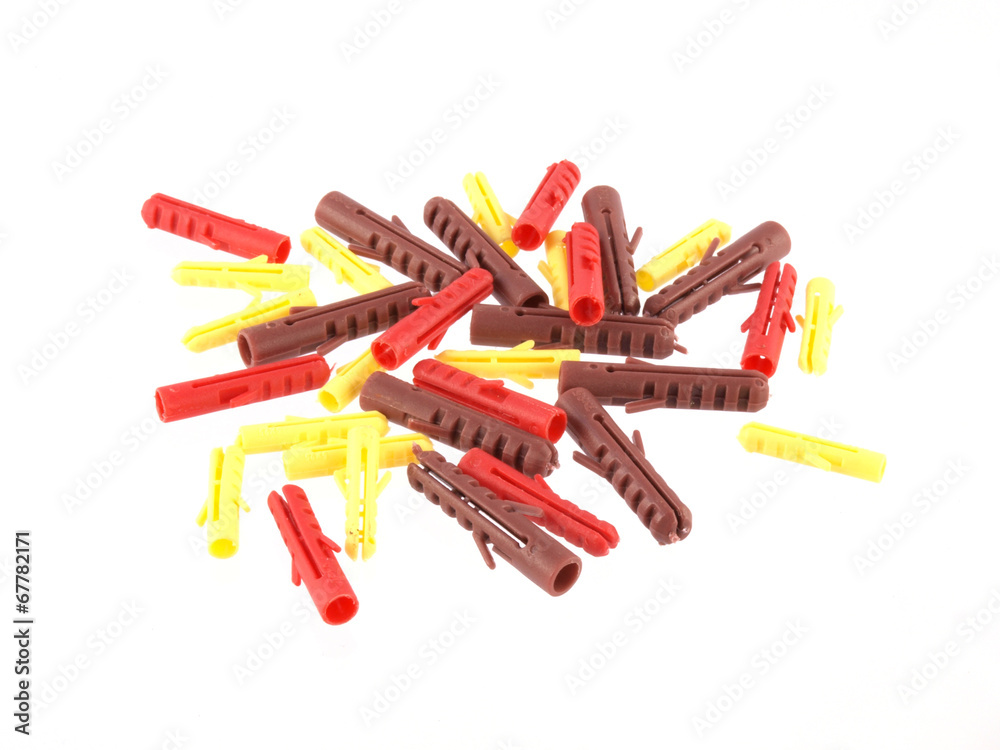 Close up of assorted raw plugs on a white background. Close up of assorted raw plugs on a white background.