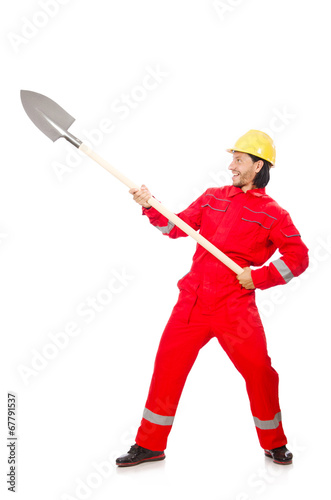 Man in red coveralls with spade © Elnur